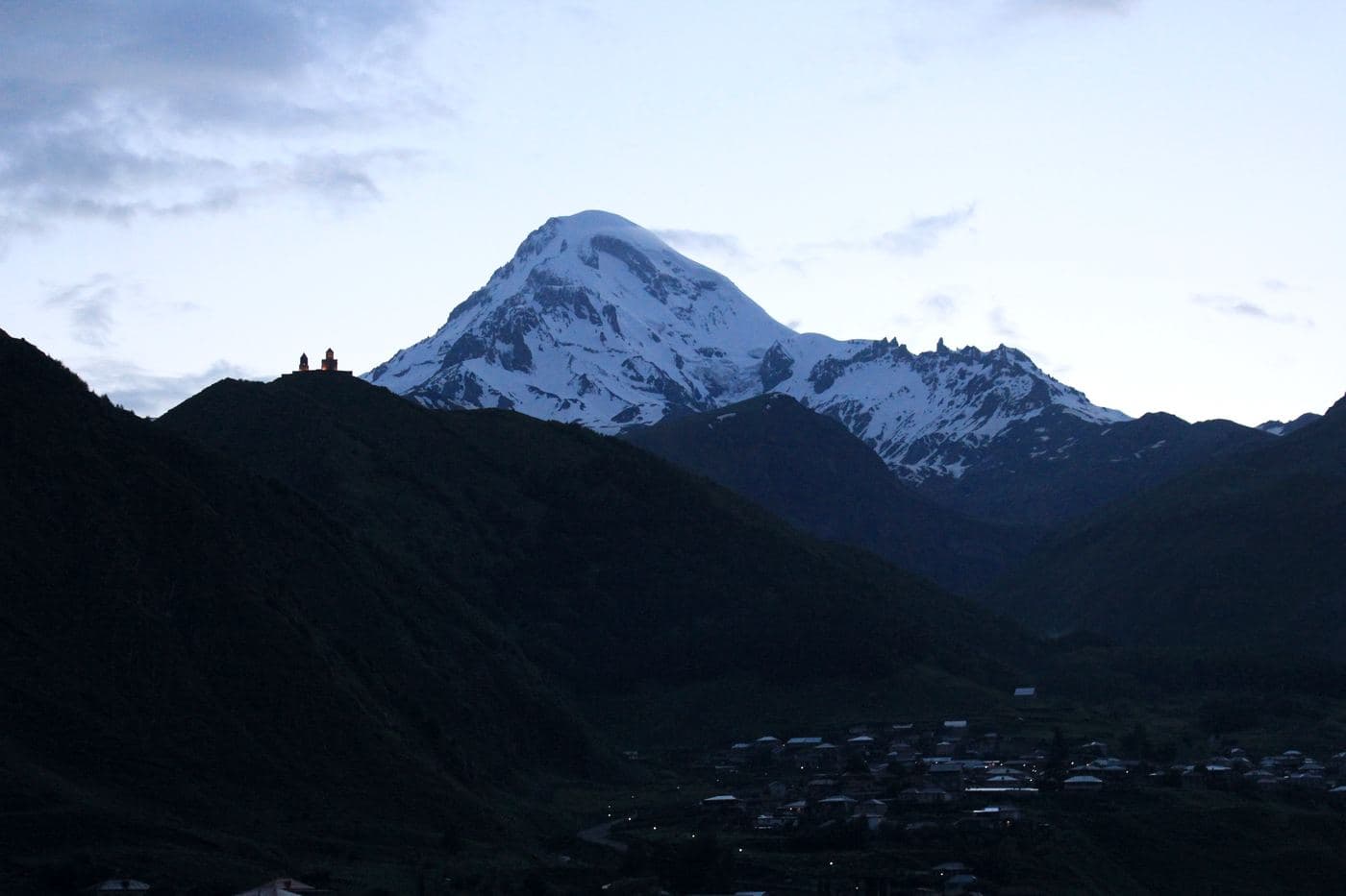 Kazbegi, Gergeti Trinity Church and Mt Kazbek Mount Kazbek is a dormant stratovolcano and one of the major mountains of the Caucasus located on the border of Ge